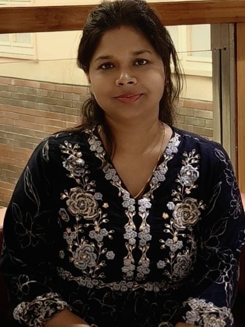 Dr. Rajnee Sinha in a black embroidered kurta